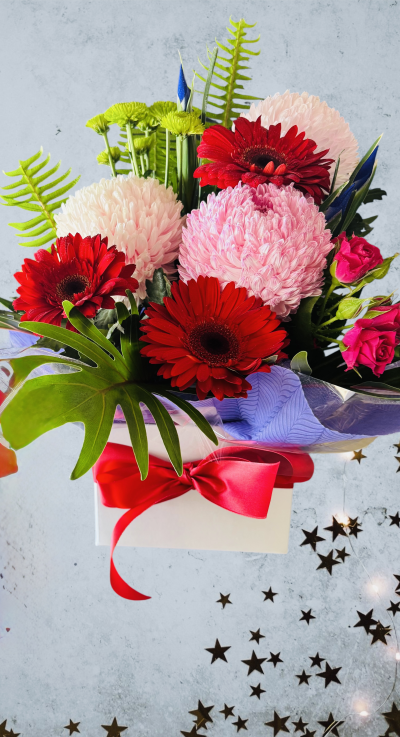 Merry Christmas - A very pretty Christmas arrangement 
long lasting flowers ideal for seasons greetings